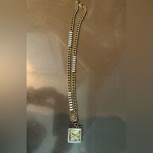 Jewel Kade birds have wings charm on crystal necklace.    Ultra Rare.